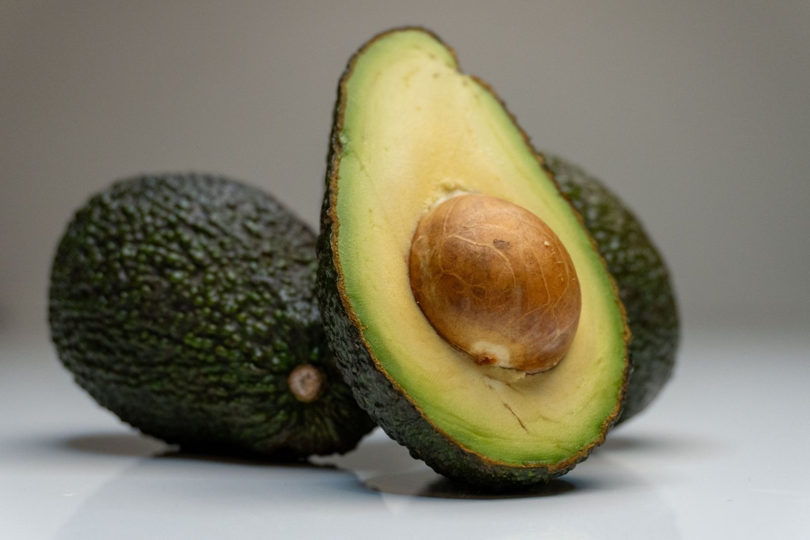 Halved Hass avocado